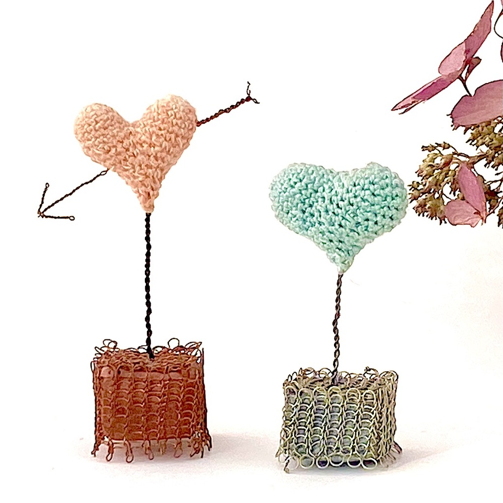 Handmade thread and wire crochet heart.  Turkish linen thread and plated wire.